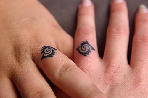 wedding ring tattoos without mentioning the possibility of splitting up.