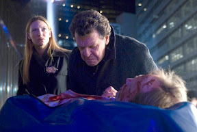 FRINGE: Walter (John Noble, R) and Olivia (Anna Torv, L) investigate a death at Massive Dynamic headquarters in the FRINGE episode The Dreamscape FRINGE: Walter (John Noble, R) and Olivia (Anna Torv, L) investigate a death at Massive Dynamic headquarters in the FRINGE episode The Dreamscape