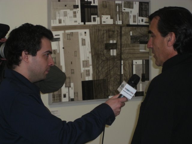 The Artist and curator of the exhibition Francisco Urbano giving an interview to TV
