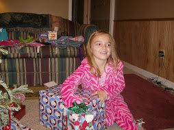 Me on Christmas Morning opening Somethinng!!!