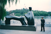 . grounds of Kenwood House. It couldn't have happened in Beijing, . (henry moore and guard)