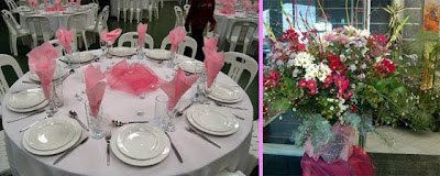 A table laid with white crockery, silver cutlery and clear glasses each with a pick serviette turned into a cone. 