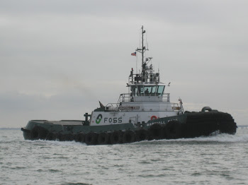 A FOSS tug, working off Richmond