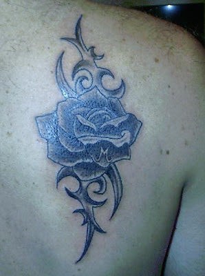 butterfly tattoos, celebrity tattoos, celtic design tattoos, celtic tattoo, celtic tattoos, cherry blossom tattoo, dolphin tattoos, flower tattoos, free tattoo flash, rose tattoo, rose tattoos