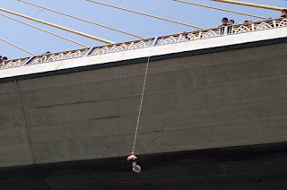 Foreigner's severed head found hanging from a bridge