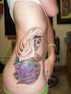 ribs tattoo female. sidepiece tattoo rib women
