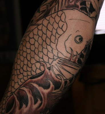Japanese koi fish arm tattoo