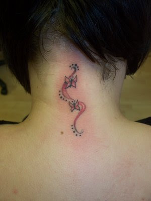 tattoos on back of neck.  neck. flower 