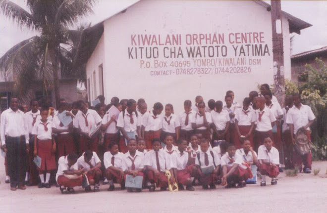 TEACHERS TOGETHER WITH THEIR STUDENTS AT SCHOOL