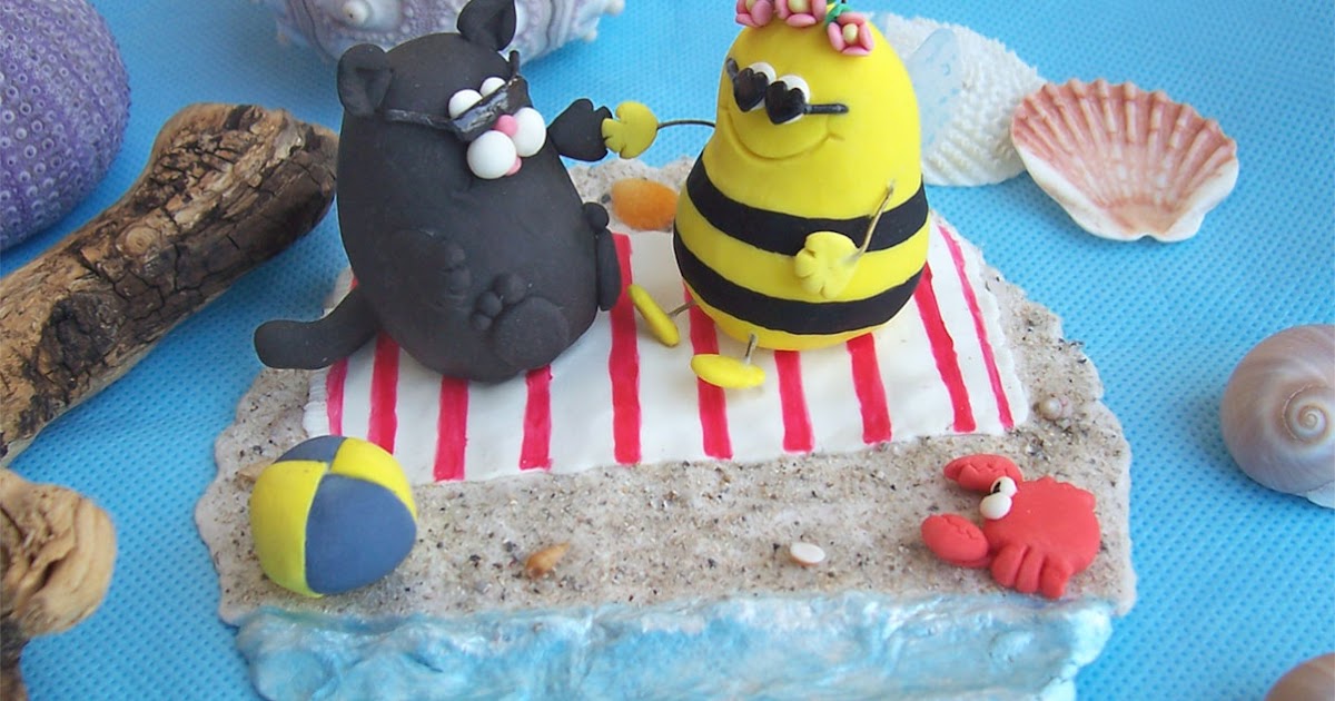 Wedding cake topper Fat cat and fat bee on the beach!