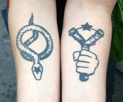 Annie graciously allowed to photograph her two tattoos, juxtaposed nicely on 