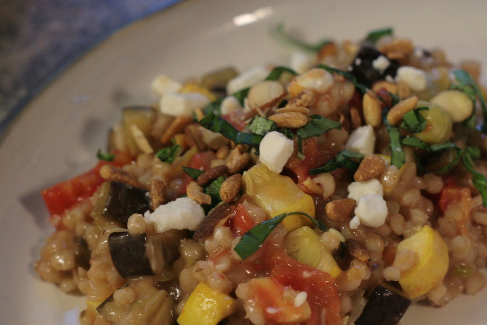 Four seasons of food Barley risotto with eggplant, summer squash, and