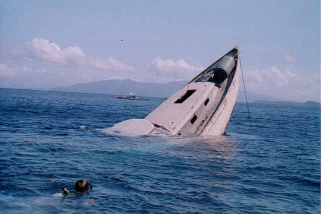 sinking boat photo
