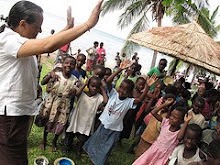 The Children at the Namaso Bay Primary School Sing Before Feasting