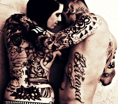This is an incredible photo of a couple that are tattooed and it really 