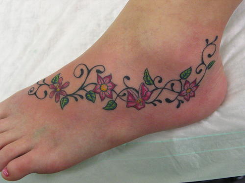 friendship tattoos on foot. butterfly tattoos on feet.