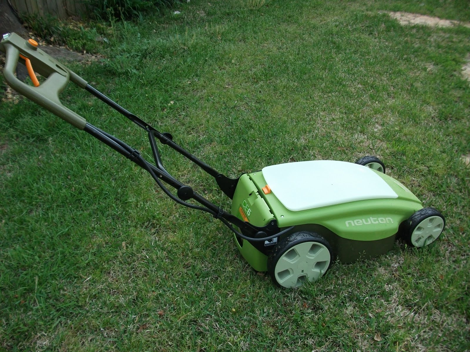Navigating the Green Sea Neuton electric lawnmower