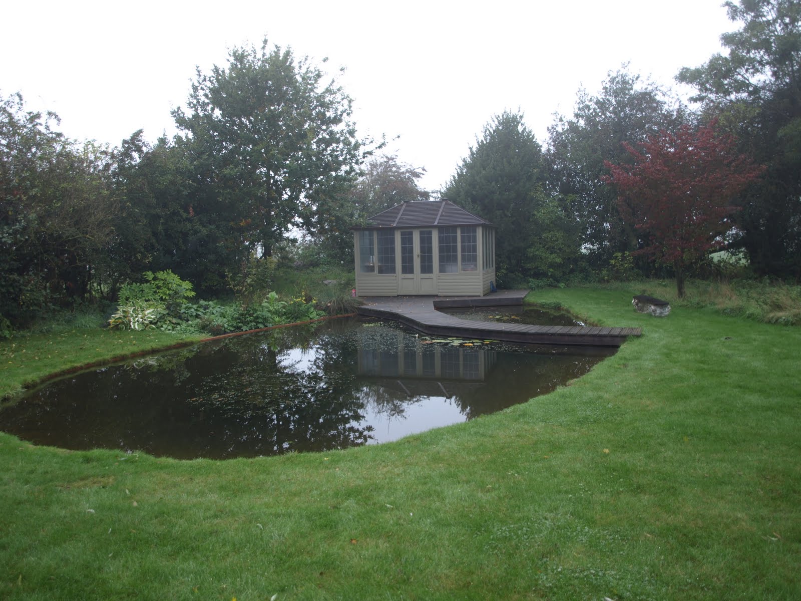 my work,bricklaying,patios and building: large pond with bridge