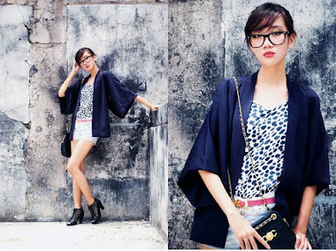 'Korean' . kimon0 style blazer. short pants. nerdy glasses.