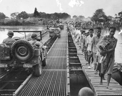 Philippines People Filipino Pinoy Pilipinas pictures photos Old Black White Pictures soldier crossing bridge pontoon river wwii jeepney 1945 noon