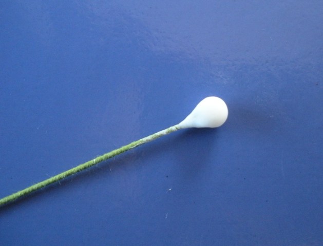 [Excess+gumpaste+pinched+off+hook.JPG]