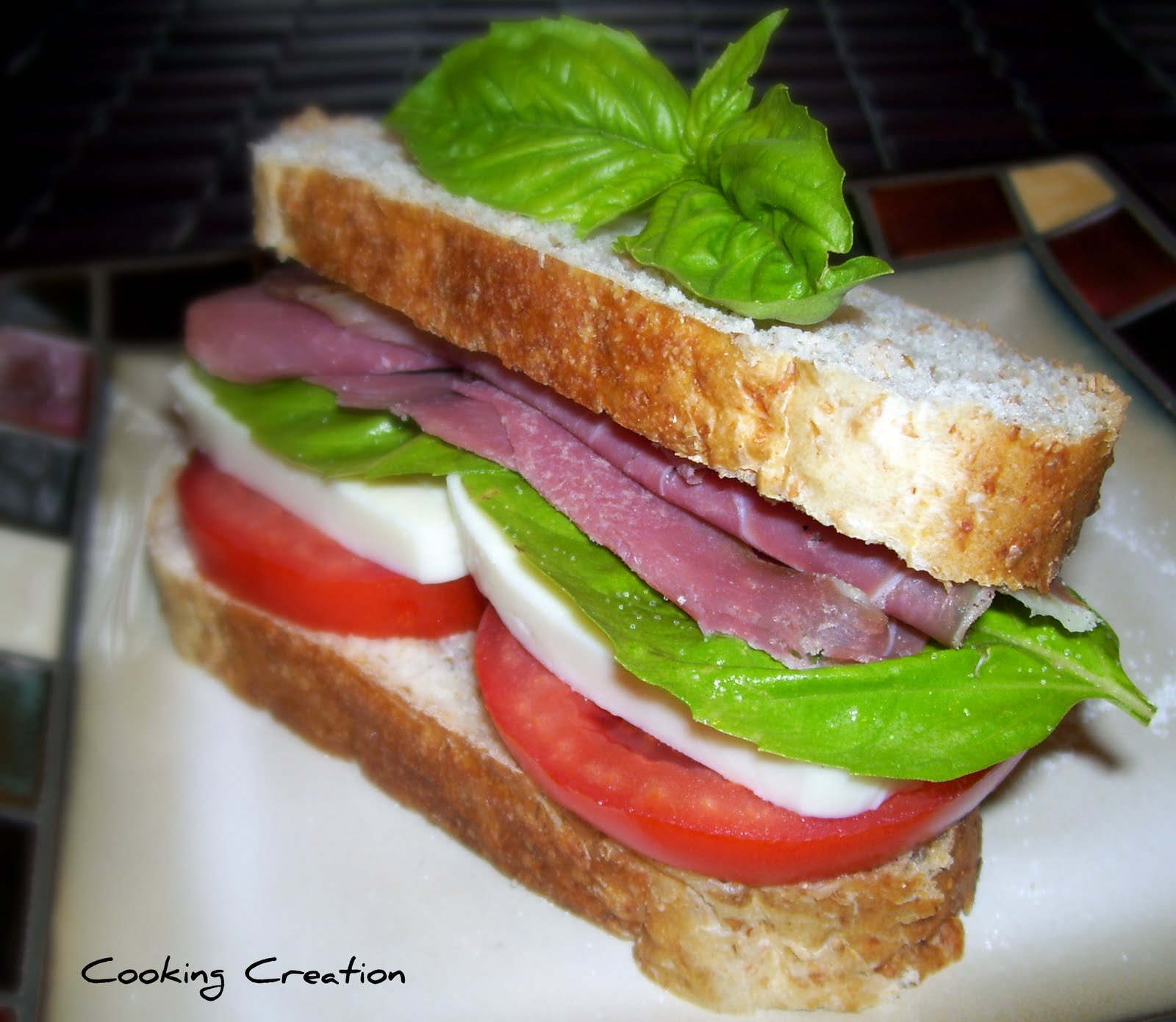 Cooking Creation Caprese and Prosciutto Sandwich