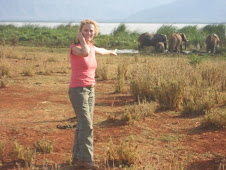 A client enjoying Elephants drinking during a tour at lake jipe