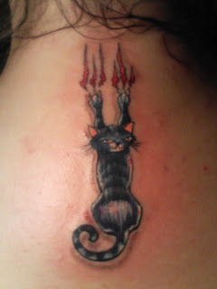 Checkout this picture gallery of cool cat tattoo design ideas.