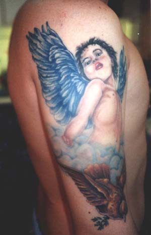 Cherub with purple wings tattoo.