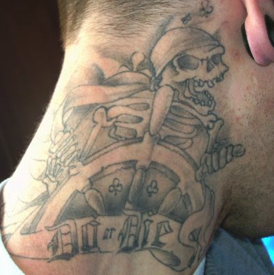 Skeleton pirate tattoo.