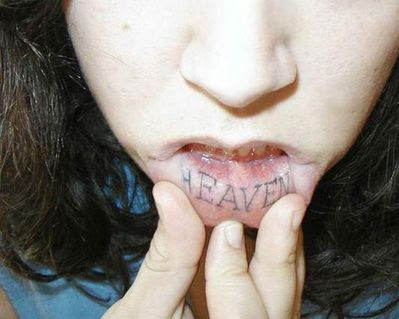 Heaven lip tattoo.