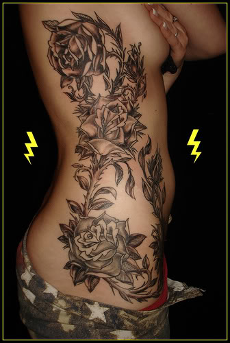 Tribal Side Tattoos. Huge rose rib tattoo.