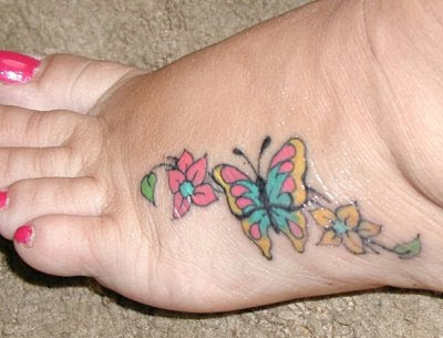 Matching foot tattoos. Flower foot tattoo. Colorful foot and ankle flower 