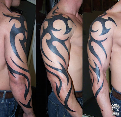 Black tribal dragon tattoos make a. Tattoos on Chest dragon
