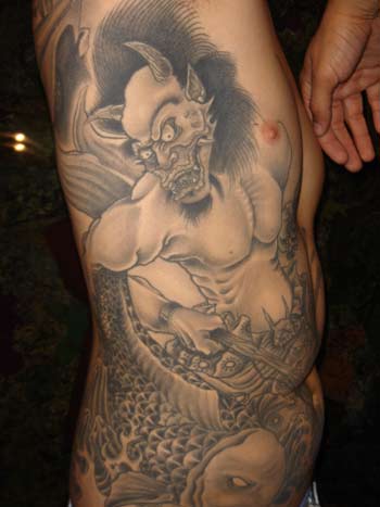 celebrity art tattoos: Demon Tattoos