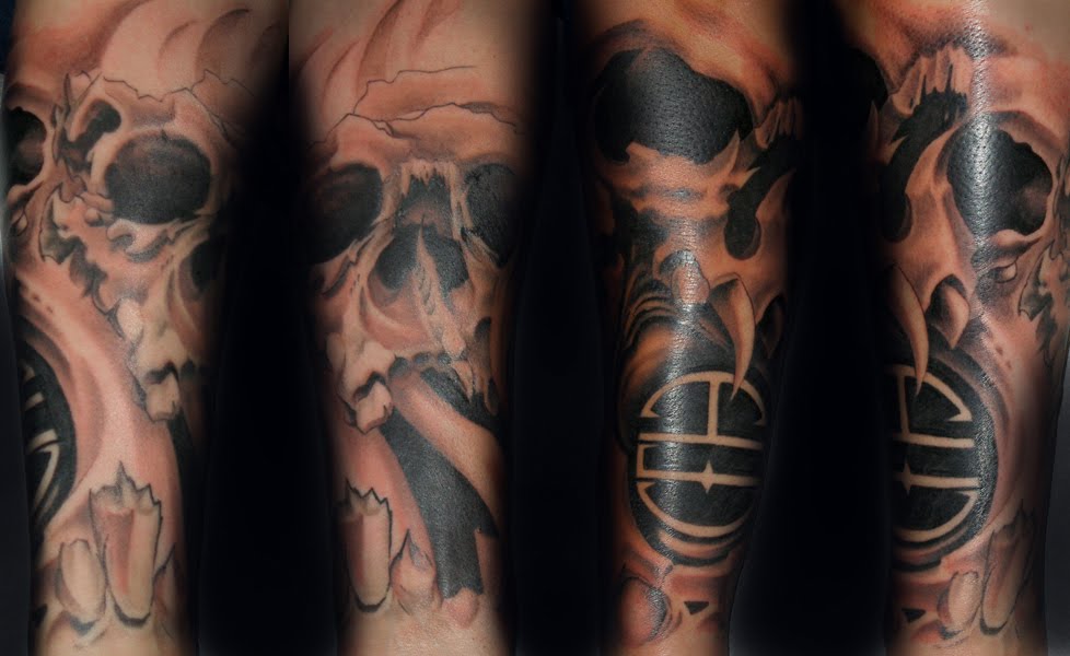 skull tattoos for men sleeves. Large skull forearm idea.