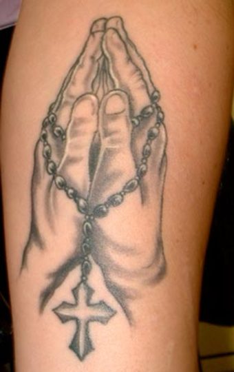 tattoos of praying hands with cross