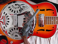 My trusty resonator, in a rejected shot from the album cover shoot