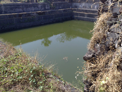 A large Well with steps, also reffered as Pohkran. Alibag Fort