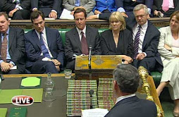 Cameron looks on as Brown attempts some political keepy-uppy