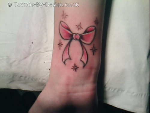bow tattoo on back of neck. Pink#39;s red ow tattoos on the