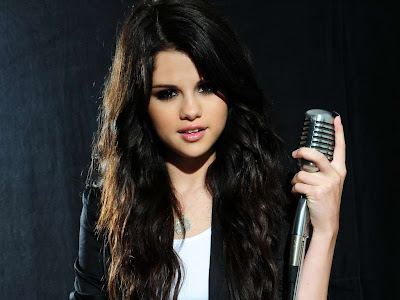 Selena Gomez is singing in photo shoot with black and white background by 