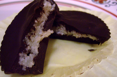 Raw Vegan Peppermint Patties split in half showing coconut inside