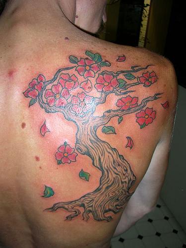dead tree tattoo. cherry tree branch tattoo.