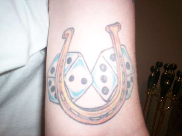 horseshoe tattoos for men. horseshoe tattoo designs.