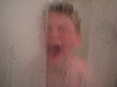 Kyle enjoying his shower....ya right!