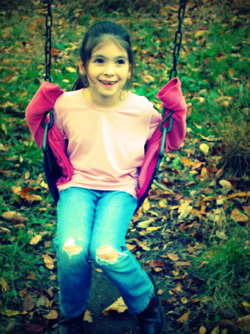 Sophia on swings