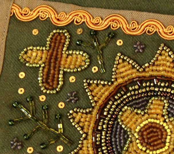 Bead embroidered belt pocket close-up