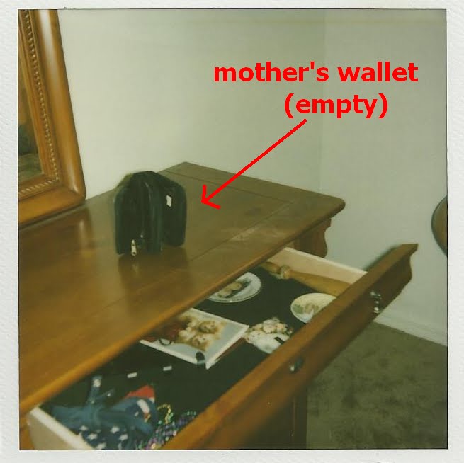Mother's wallet, emptied by Joseph Poteat