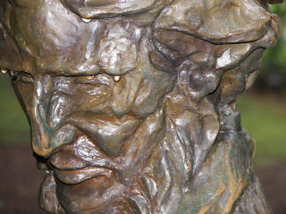 Statue of Henry David Thoreau in Walden Pond.